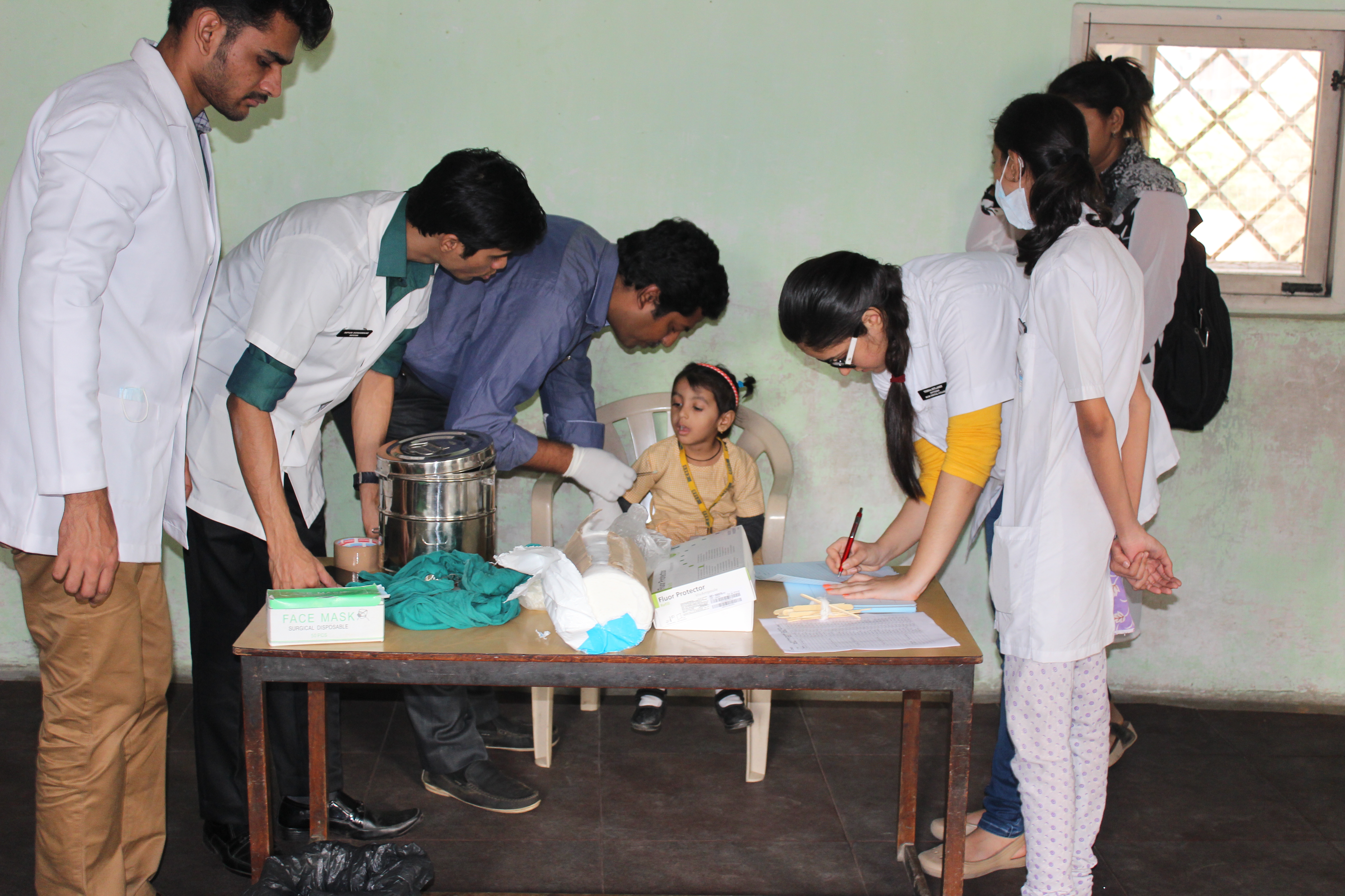 Treating children in school camps